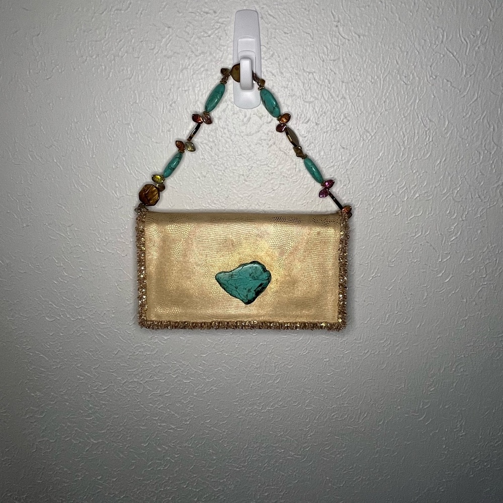 Elegant Gold Mini Bag with Turquoise Accent